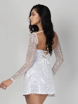 Λευκό φόρεμα με ασημένιες παγέτες, διαφανή μανίκια & κορδέλα