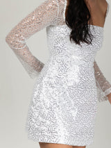 Λευκό φόρεμα με ασημένιες παγέτες, διαφανή μανίκια & κορδέλα